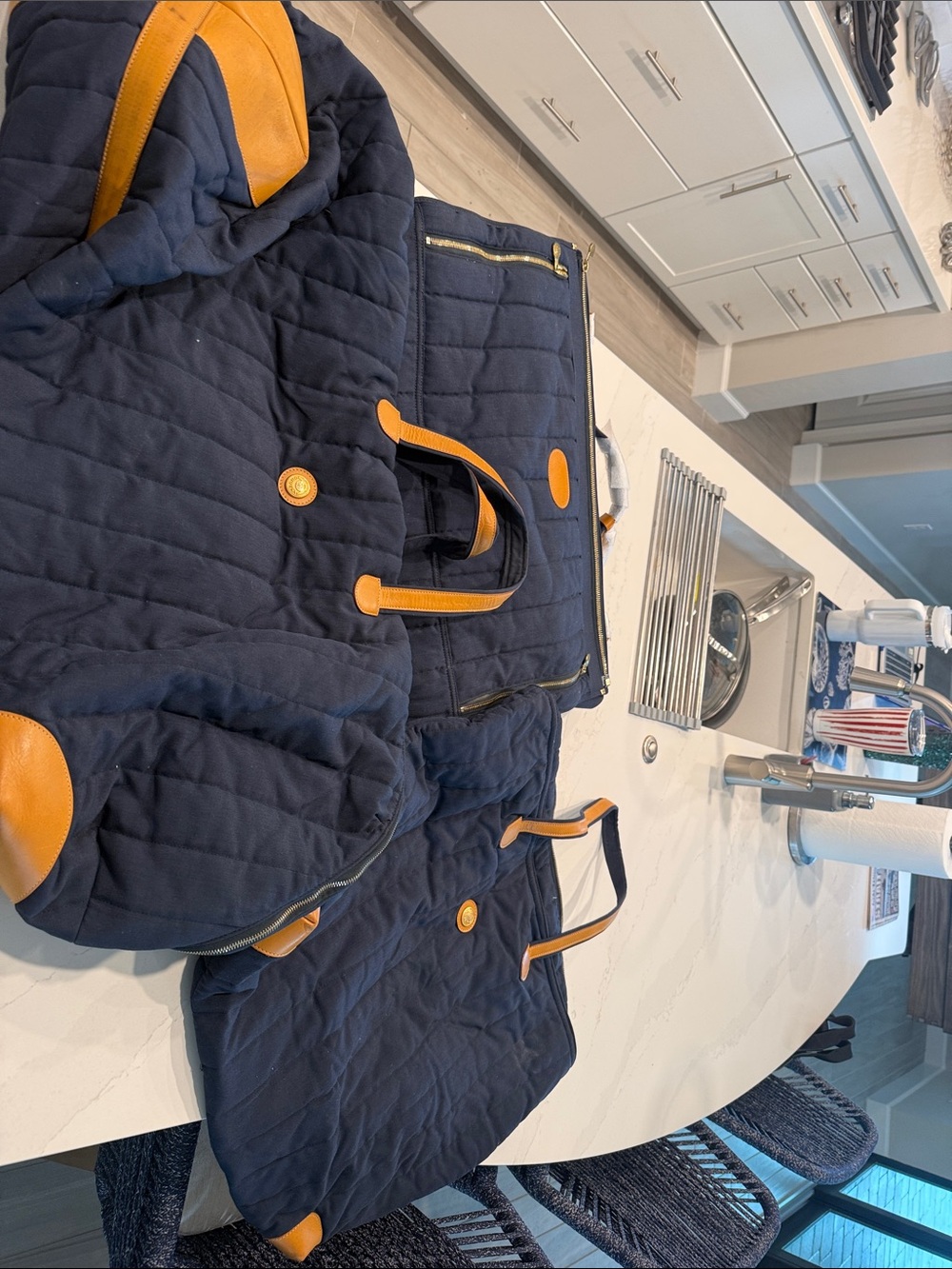 Set of 3 GHURKA luggage bags. Navy Blue Cloth and leather .1 new,2 gently used.